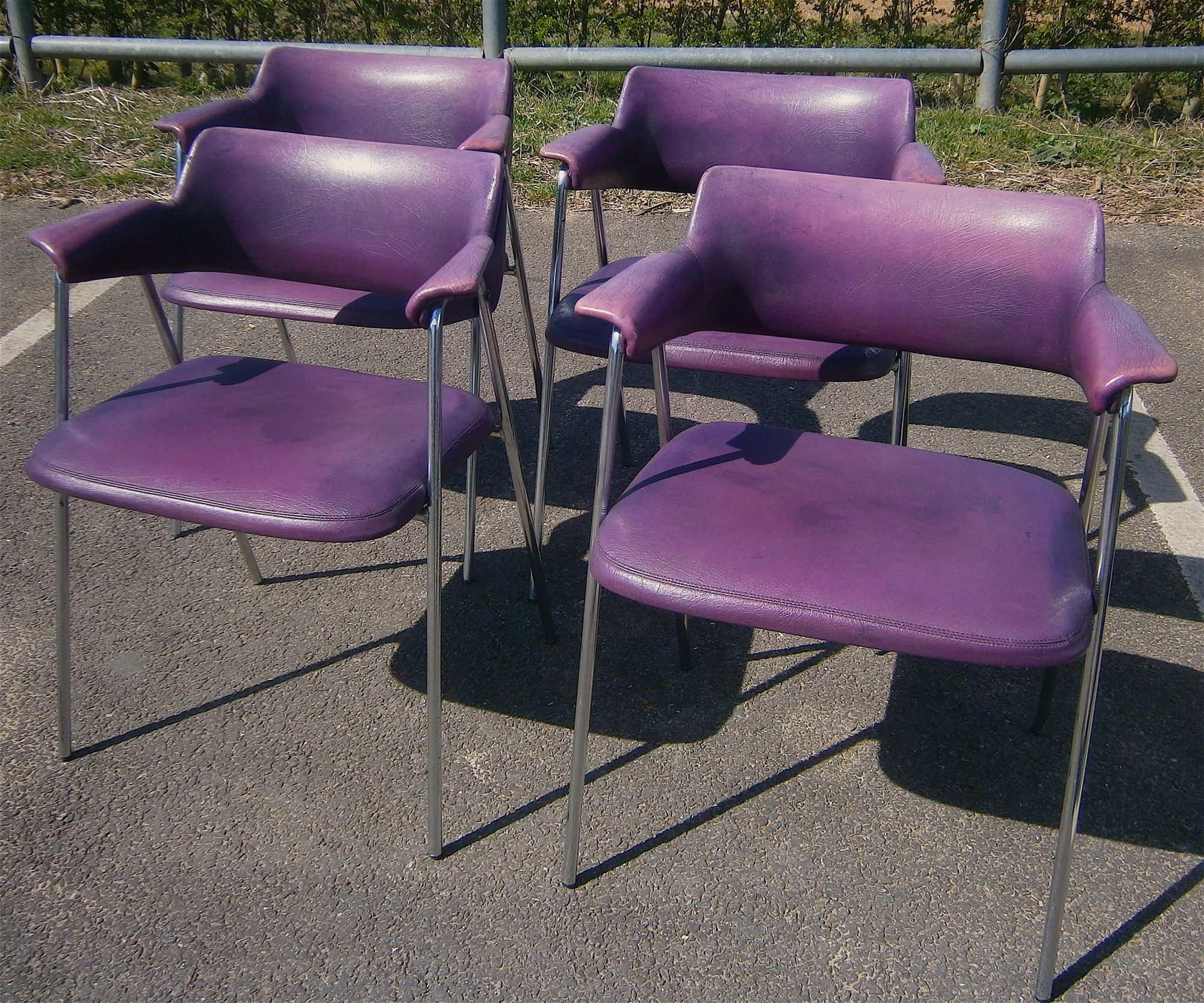 A set of four 1960s chrome framed Pel style elbow chairs